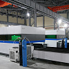 FL-L1560FHE-1000-IPG Лазерный станок для резки листового металла с кабинетной защитой и сменным столом